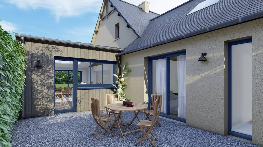 Cour et terrasse d'une maison rénovée, perspective